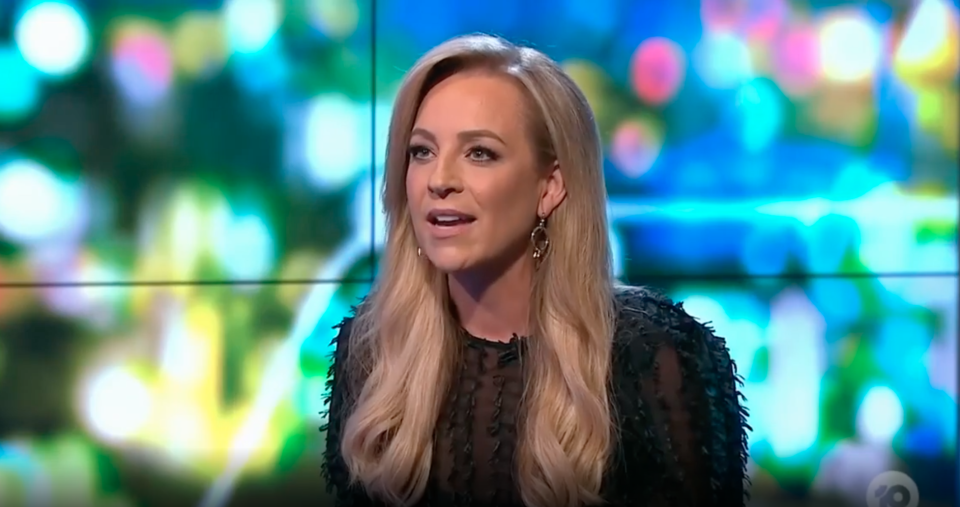 Carrie Bickmore in a black top on The Project