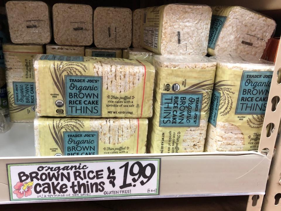 A display of Trader Joe's organic brown rice-cake thins, with a price tag that reads $1.99/