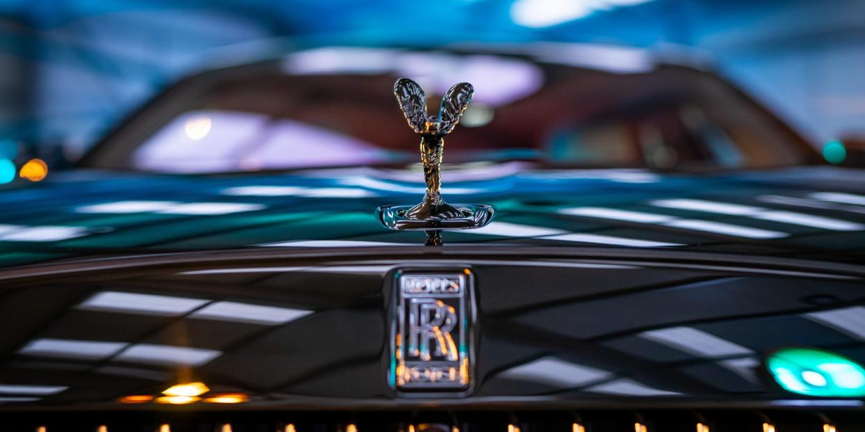 The Rolls-Royce Ghost Black Badge at night.