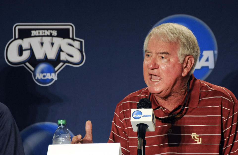 FILE - Florida State coach Mike Martin speaks during the coaches news conference at TD Ameritrade Park in Omaha, Neb., Thursday, June 14, 2012. Martin, a member of the College Baseball Hall of Fame who won an NCAA Division I record 2,029 games in 40 seasons as Florida State’s baseball coach, died Thursday, Feb. 1, 2024, after a three-year battle with dementia. He was 79. (AP Photo/Eric Francis, File)