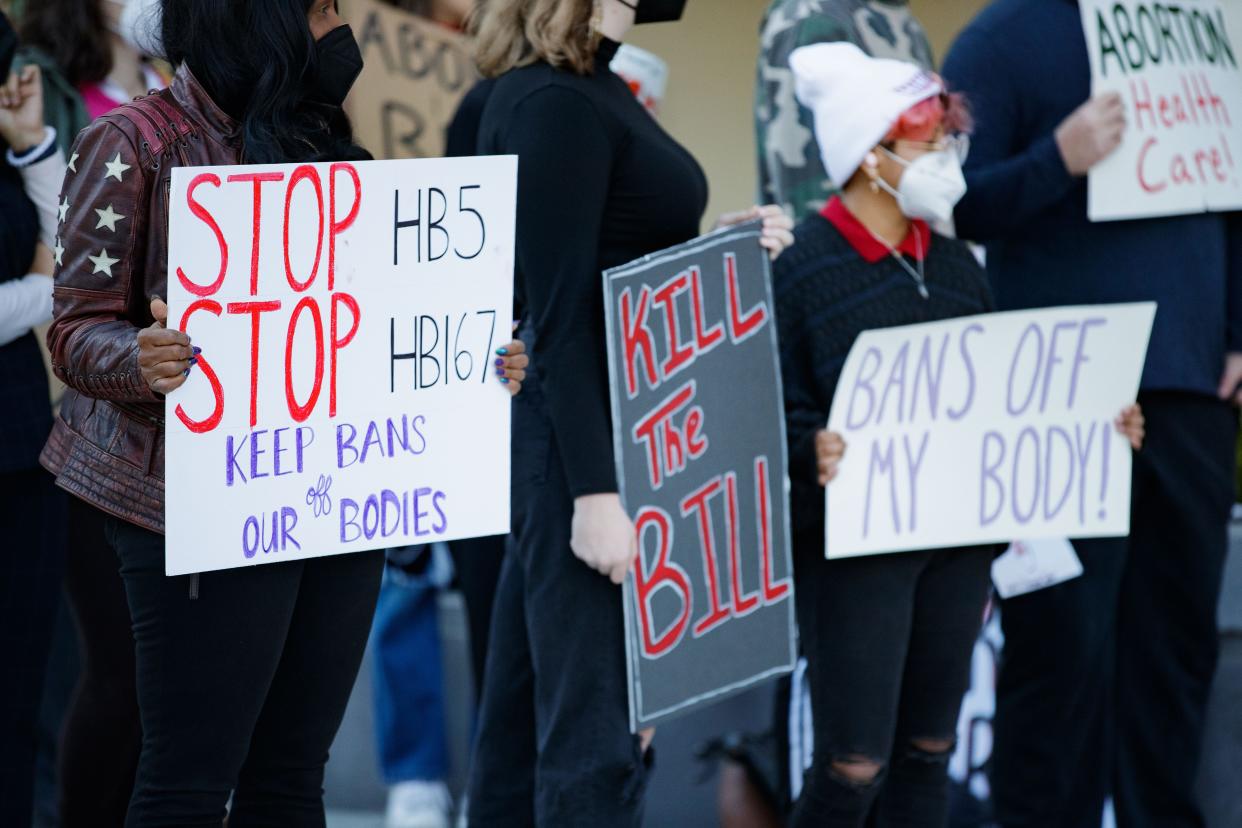 A crowd of roughly 50 protesters gathered outside in the Florida House plaza to voice their opposition to HB5, an abortion ban bill copying the Texas abortion ban bill, Thursday, Jan. 27, 2022.