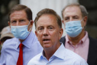 FILE- In this Aug. 7, 2020, file photo, Connecticut Gov. Ned Lamont addresses the media in Westport, Conn. During a coronavirus briefing on Thursday, Aug. 20, 2020, Lamont said the Connecticut Department of Labor will be applying for a federal program that could lead to $300 in additional weekly unemployment benefits for certain recipients who've lost work because of the coronavirus pandemic. (AP Photo/John Minchillo, File)