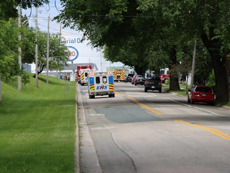 Cape Breton regional police directed traffic away from three blocks in Sydney's North End neighbourhood Friday due to a gas leak at the Imperial Esso fuel tank enclosure. (Thomas Ayers/CBC - image credit)