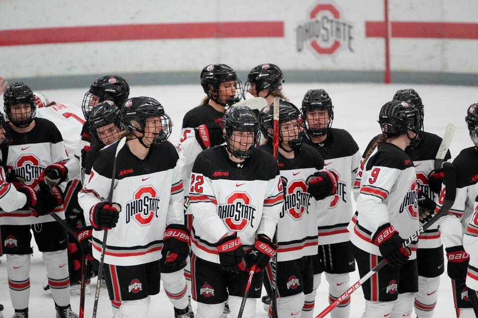 Jan 13, 2023; Columbus, Ohio, USA;  The Ohio State Buckeyes celebrate their win over the Wisconsin Badgers in the NCAA women's hockey game at the OSU Ice Rink. Ohio State won 2-1 in overtime. Mandatory Credit: Adam Cairns-The Columbus Dispatch