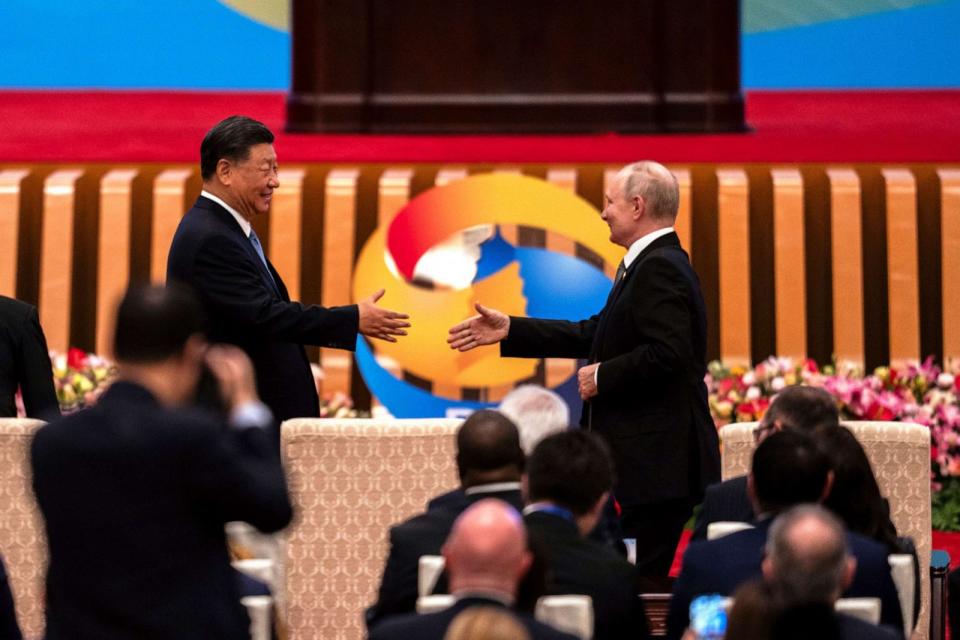 PHOTO: Chinese President Xi Jinping, left, and Russian President Vladimir Putin shake hands during the Belt and Road Forum at the Great Hall of the People in Beijing, Oct. 18, 2023. (Louise Delmotte/AP)