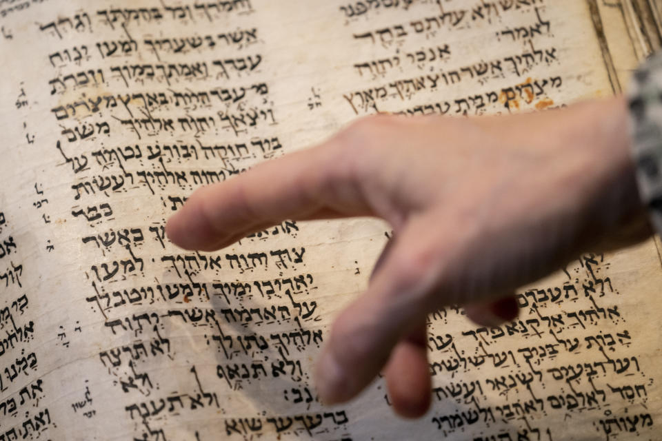 FILE - Sotheby's unveils the Codex Sassoon for auction, Wednesday, Feb. 15, 2023, in the Manhattan borough of New York. The 1,100-year-old Hebrew Bible that is one of the oldest surviving biblical manuscripts sold for $38.1 million, which includes the auction house's fee, Wednesday, May 17, 2023, in New York. (AP Photo/John Minchillo, File)