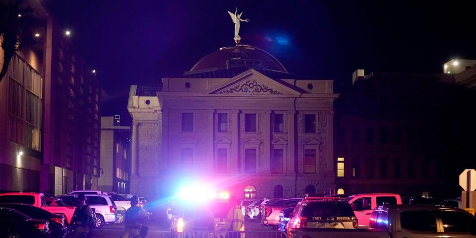 A large number of police surround the Arizona Capitol after protesters reached the front of the AZ Senate building following the Supreme Court's decision to overturn Roe v. Wade Friday, June 24, 2022, in Phoenix.