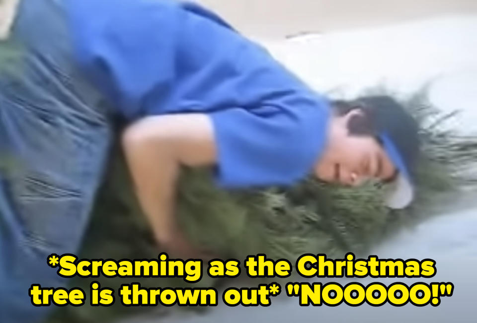 Dylan screaming "NOOO!" and hanging onto a Christmas tree that's being thrown out