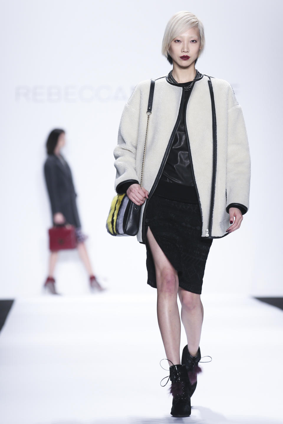 The Rebecca Minkoff Fall 2014 collection is modeled during Fashion Week, Friday, Feb. 7, 2014, in New York. (AP Photo/John Minchillo)