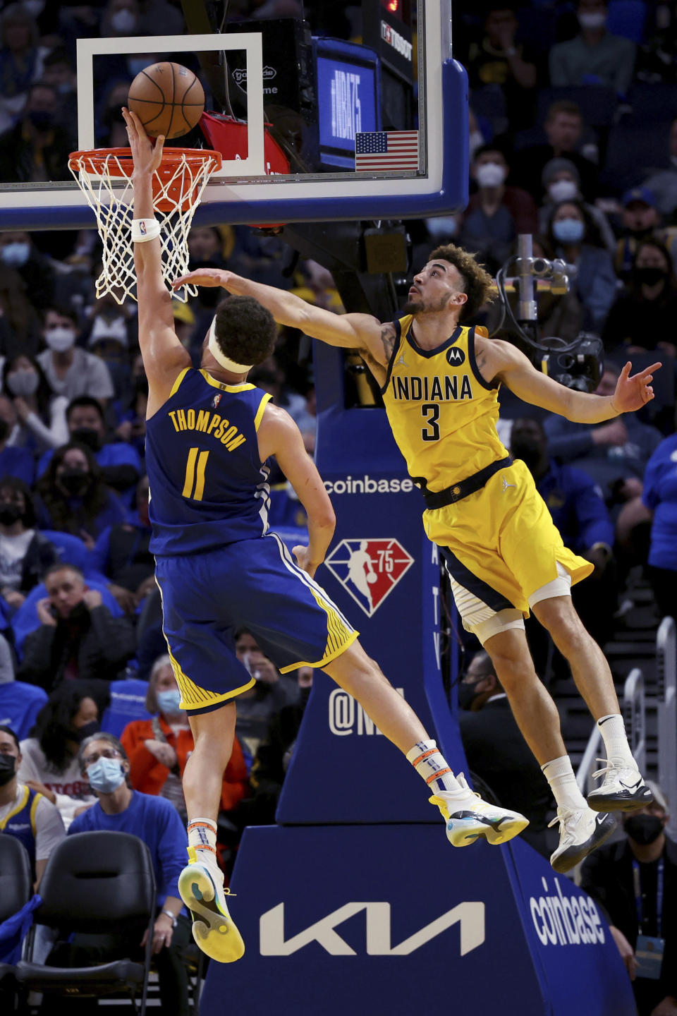 Golden State Warriors guard Klay Thompson (11) shoots against Indiana Pacers guard Chris Duarte (3) during the first half of an NBA basketball game in San Francisco, Thursday, Jan. 20, 2022. (AP Photo/Jed Jacobsohn)