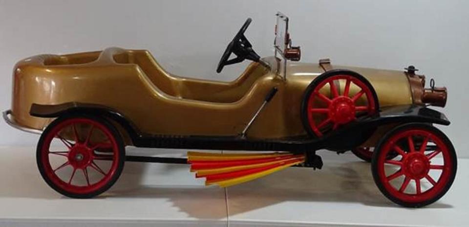 The rare 1960s Chitty Chitty Bang Bang child’s pedal car was made by Pines factory and is estimated to fetch £1,000-£1,500 (Excalibur Auctions/PA)