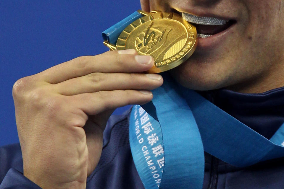 <b>Ryan Lochte's Flag Grill:</b> US swimmer Ryan Lochte, who won the gold medal in the men's individual 400 meter individual medley, supports an American flag-themed grill, and it almost cost him his gold medal. A spokesman from the International Olympics Committee stated that the grill may not be a part of the permissible uniform.<br><br> <a href="http://in.news.yahoo.com/lochtes-us-flag-grill-almost-cost-him-gold-075705560--spt.html " data-ylk="slk:Lochte's grill almost cost him gold;elm:context_link;itc:0;sec:content-canvas;outcm:mb_qualified_link;_E:mb_qualified_link;ct:story;" class="link  yahoo-link">Lochte's grill almost cost him gold</a>