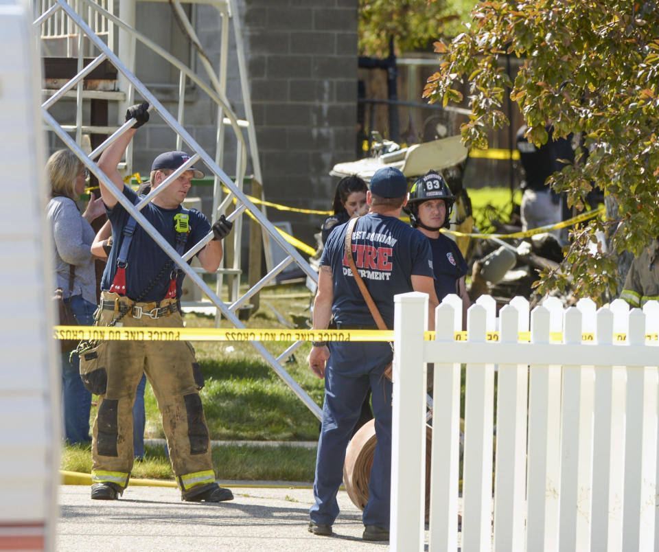 Emergency crews respond to a small plane crash, Saturday, July 25, 2020, in West Jordan, Utah. (Leah Hogsten/The Salt Lake Tribune via AP)