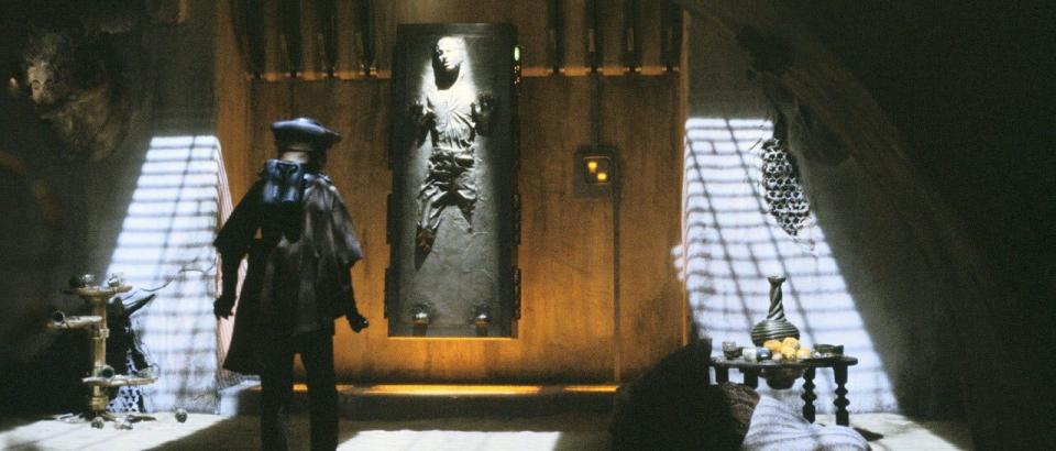 Han Solo hangs in carbonite on the wall in Jabba the Hutt's palace in a scene from "Return of the Jedi."