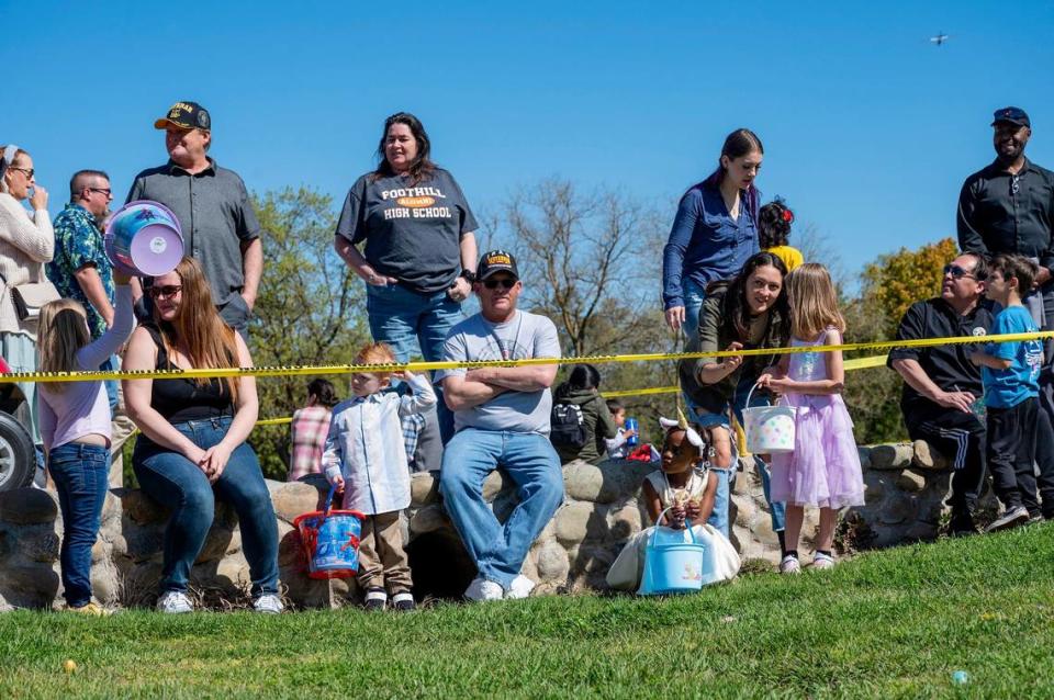 Families wait with their children during the Haggin Oaks Easter Egg Hunt on Sunday, April 9, 2023, in Sacramento.