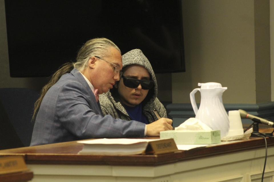 Victor Razumov appears with his attorney Harley Breite in state Superior Court in Sussex County on July 19, 2018.