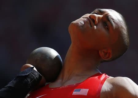 Ashton Eaton of the U.S. competes in the men's decathlon shot put event during the 15th IAAF World Championships at the National Stadium in Beijing, China August 28, 2015. REUTERS/Kai Pfaffenbach