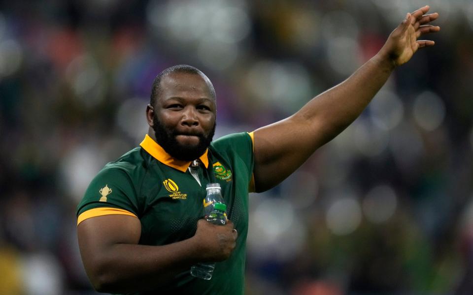 South Africa's Ox Nche celebrates at the end of the Rugby World Cup quarterfinal match between France and South Africa at the Stade de France in Saint-Denis