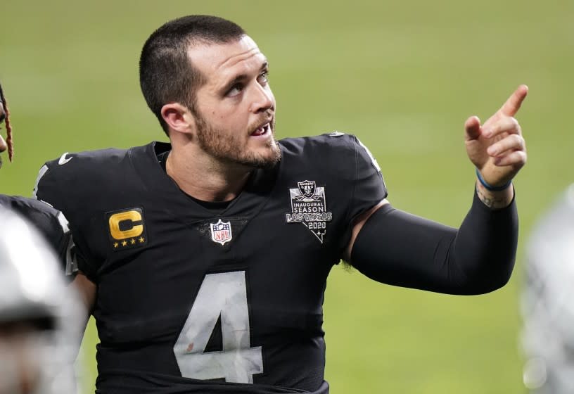 Las Vegas Raiders quarterback Derek Carr #4 leaves the field after losing to the Kansas City Chiefs in an NFL football game, Sunday, Nov. 22, 2020, in Las Vegas. (AP Photo/Jeff Bottari)