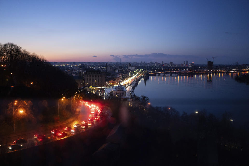 Cars drive along in traffic after heavy rainfall in Kyiv, Ukraine on Friday, March 29, 2024. (AP Photo/Alex Babenko)