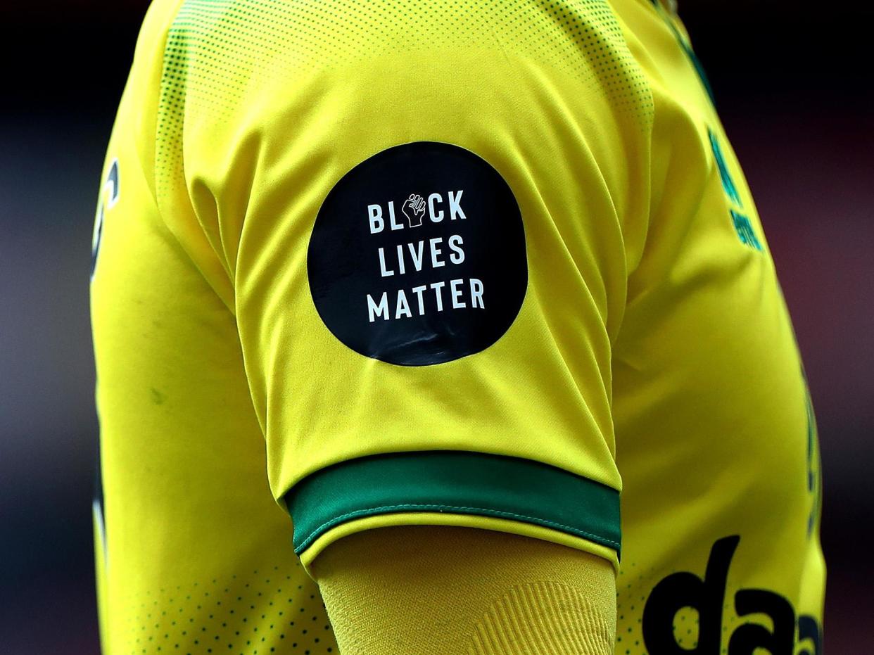 A detailed view of a Black Lives Matter badge: 2020 Pool