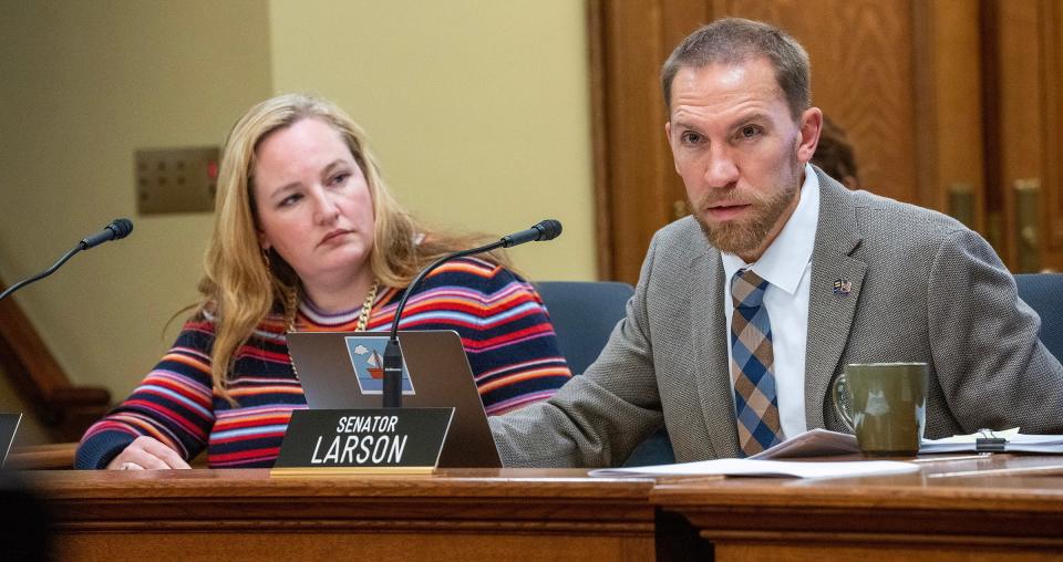 Sen. Chris Larson (D-Milwaukee), right,  speaks as Sen. Sen. Kelda Roys (D-Madison) listens Thursday, January 12, 2023 during a meeting by the Joint Committee on Administrative Rules at the Capitol in Madison, Wis. Republicans on the Joint Committee on Administrative Rules voted Thursday to suspend a rule first developed in 2020 by the state Department of Safety and Professional Services’ board that licenses marriage and family therapists, counselors and social workers that prohibited conversion therapy. The committee had blocked the rule in 2021 but it went back into effect in December.