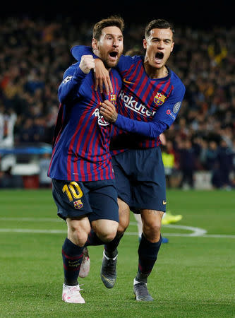 Soccer Football - Champions League Quarter Final Second Leg - FC Barcelona v Manchester United - Camp Nou, Barcelona, Spain - April 16, 2019 Barcelona's Lionel Messi celebrates scoring their first goal with Philippe Coutinho Action Images via Reuters/Carl Recine