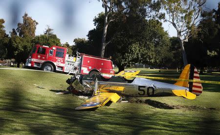 An airplane sits after crash landing at Penmar Golf Course in Venice California March 5, 2015. REUTERS/Lucy Nicholson