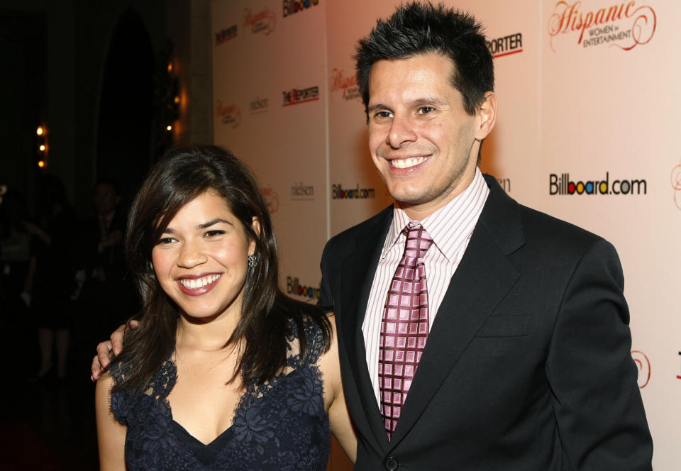 FILE - This Oct. 9, 2007 file photo shows "Ugly Betty" actress America Ferrera, left, and show creator Silvio Horta at the Billboard magazine Hispanic Women in Entertainment breakfast in Los Angeles, where Ferrera received the Hispanic Woman of the Year award. Horta died in Miami on Tuesday, Jan. 8, 2020. He was 45. (AP Photo/Matt Sayles, File)