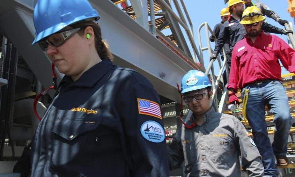 Engineers from the bureau of safety and environmental enforcement inspect an oil platform in the Gulf of Mexico in 2018.