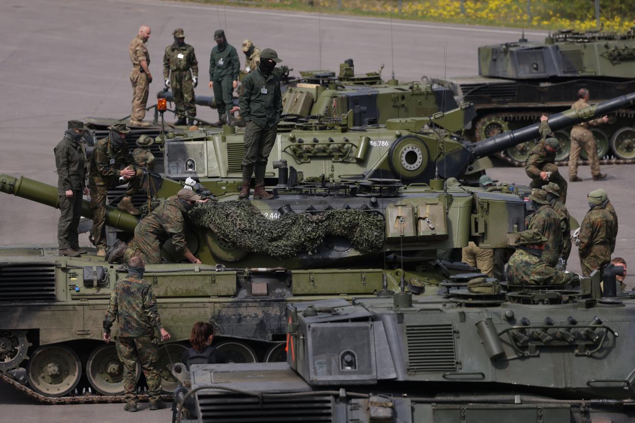 Ukrainian tank crews stand on Leopard 1A5 main battle tanks they are being trained to operate and maintain by German and Danish military personnel at a military training ground of the Bundeswehr near Klietz, Germany (Getty Images)