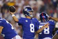 New York Giants quarterback Daniel Jones (8) throws the ball during the first half of an NFL football game against the Washington Football Team, Thursday, Sept. 16, 2021, in Landover, Md. (AP Photo/Alex Brandon)