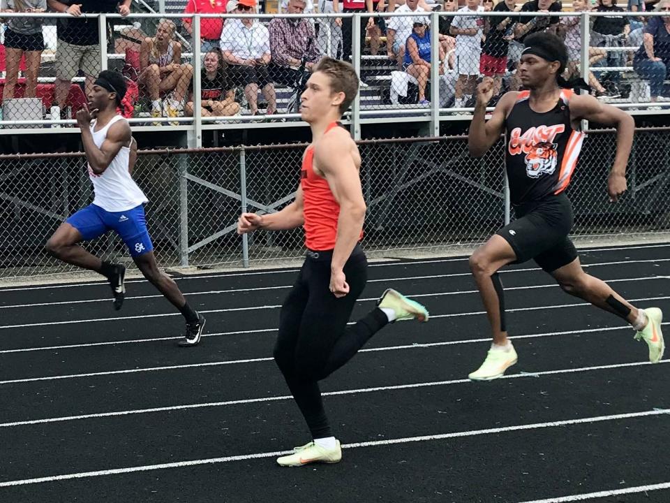 North Union's Lincoln Harrah runs the boys 200 dash during the Division II regional at Lexington last year.