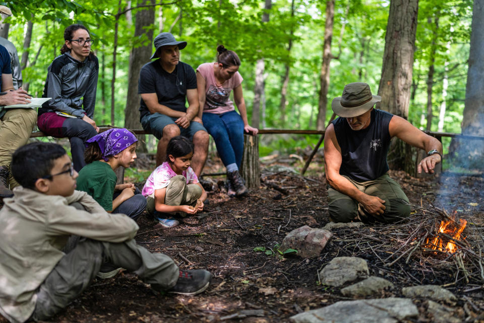 Shane Hobel talks about the kind of fire he likes: coals, not high flames. (Michael Rubenstein / for NBC News)