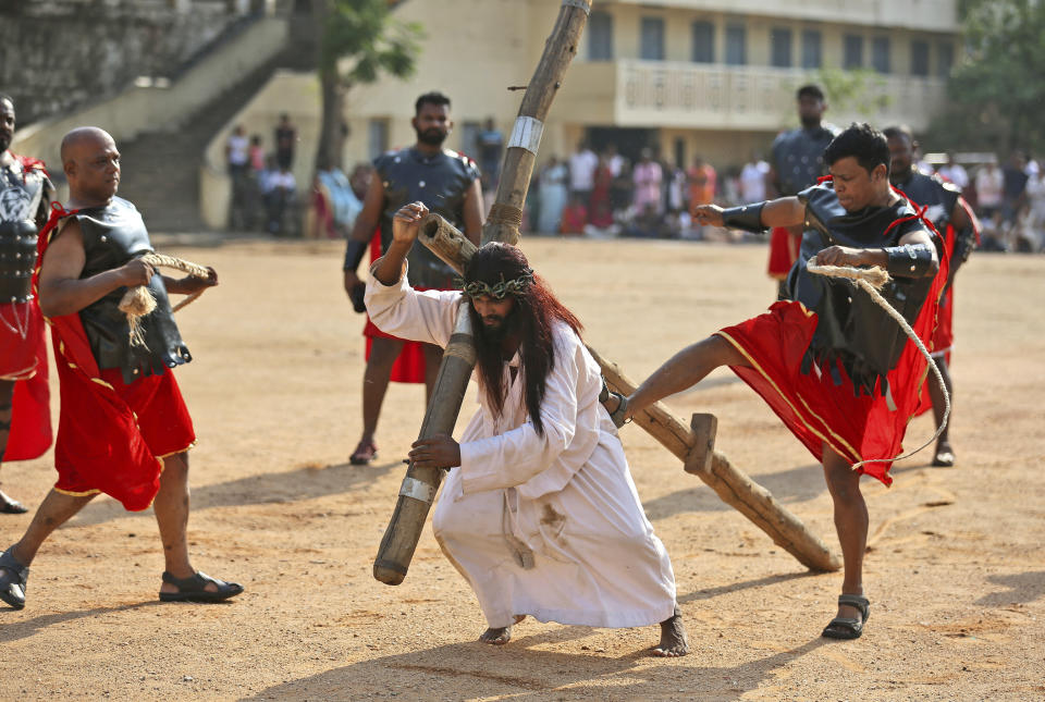 Christian devotees reenact the crucifixion of Jesus Christ in Hyderabad, India, on April 19, 2019. (Mahesh Kumar A / ASSOCIATED PRESS)