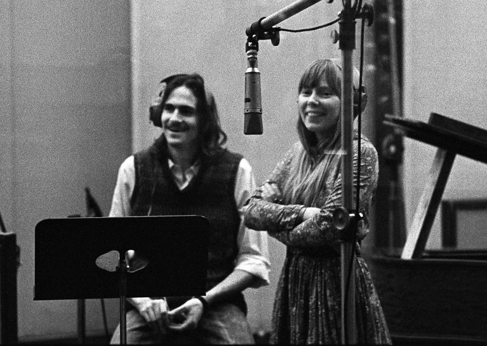 James Taylor and Joni Mitchell in a recording studio in Los Angeles in 1971.