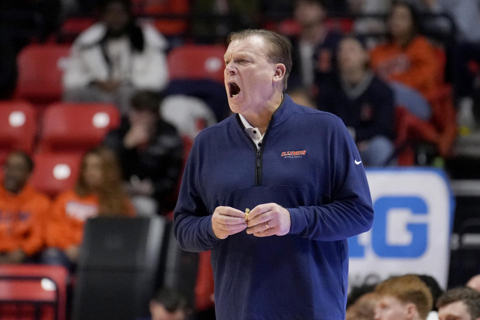 Illinois head coach Brad Underwood directs his team during the second half of an NCAA college basketball game against Colgate Sunday, Dec. 17, 2023, in Champaign, Ill. Illinois won 74-57. (AP Photo/Charles Rex Arbogast)