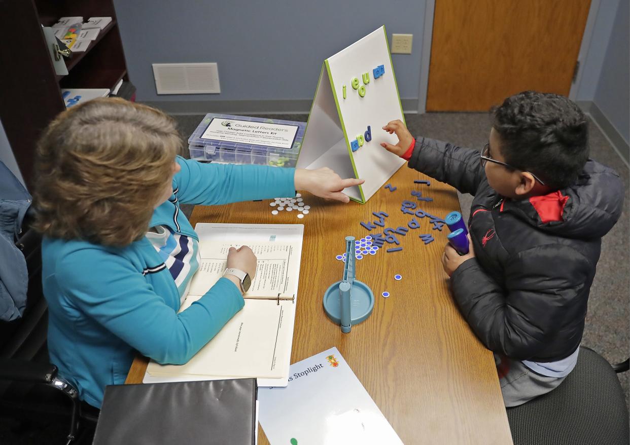 Tutor Kate Aicole works with Davis Hernadez-Reyez during a tutoring session March 8, 2023, at Dyslexia Reading Connection in Appleton, Wis.