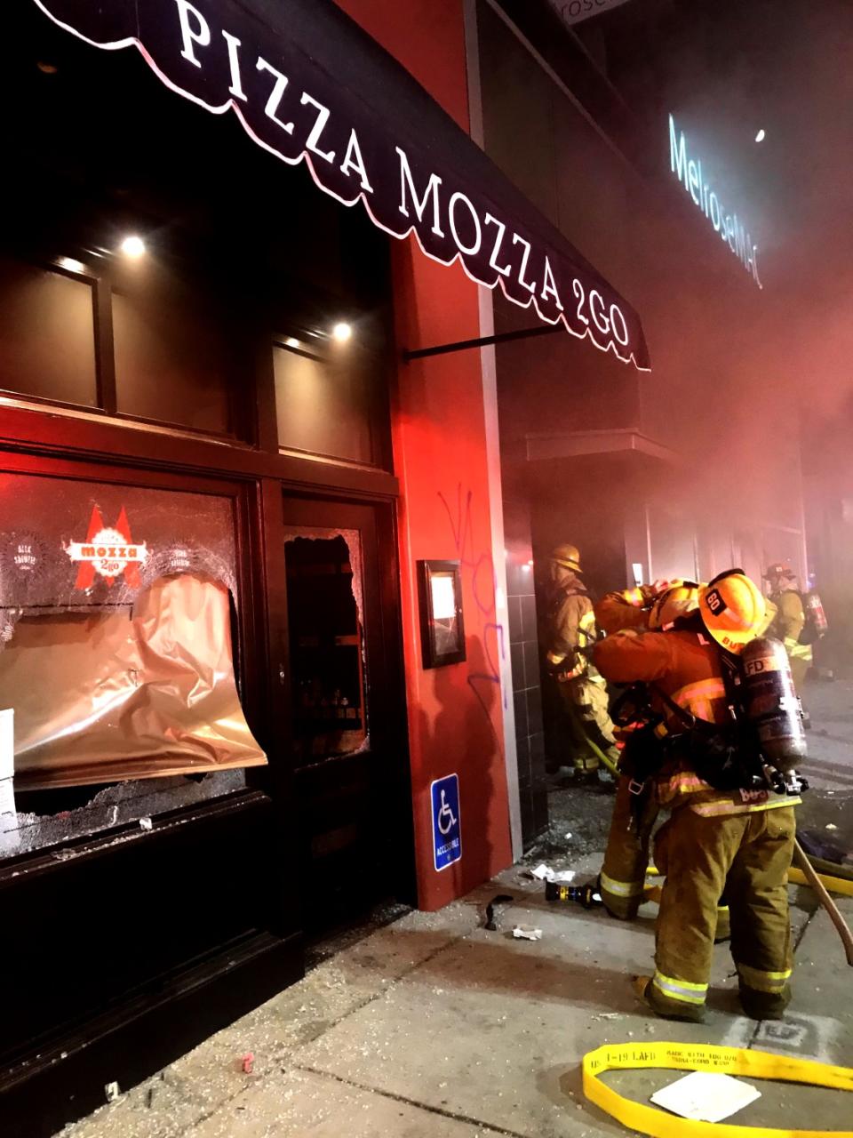 Firefighters at MelroseMac and Mozza2Go next door.