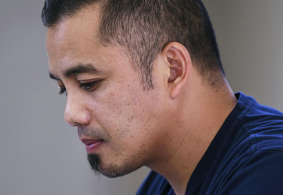 This May 4, 2018 photo shows Vanna In while interviewed in Fresno, Calif. California Gov. Jerry Brown announced Friday, Aug. 17, 2018, he pardoned three former prisoners facing the threat of deportation to Cambodia, including Vanna In, who became a youth pastor after serving six years in the 1990s for murdering a rival gang member. (Eric Paul Zamora/The Fresno Bee via AP)