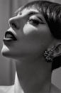 Photographed by Michael Avedon, Gaga sports a pixie cut, sharp eyeliner, and dark lips in this vintage-inspired look.