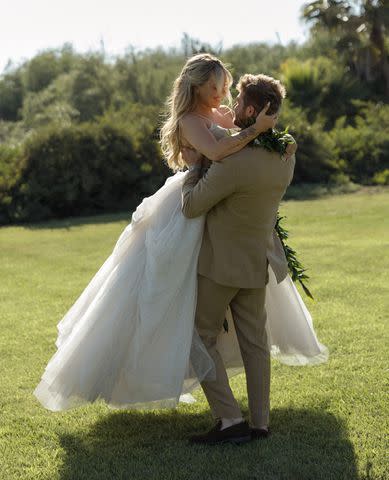 <p>AP Imagery, Andreana Peterson</p> Hype House alums Alex Warren and Kouvr Annon at their wedding at the Ethereal Gardens in Escondido, Calif., June 22.