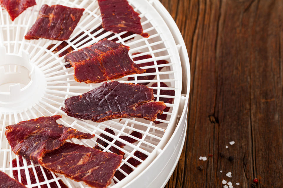 Homemade Beef Jerky with a dehydrator. Selective focus.