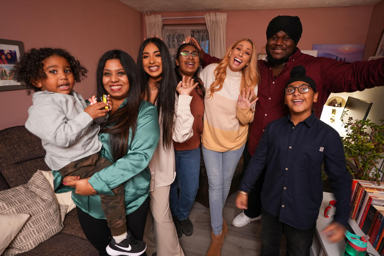 Stacey Solomon with the family in their newly organised home. (BBC)