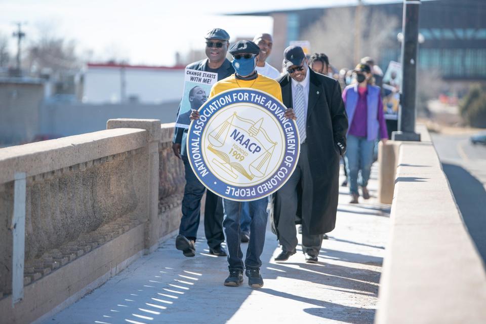 The annual Martin Luther King Jr. Day March proceeds along Union Ave. in Pueblo on Monday, January 17, 2022.