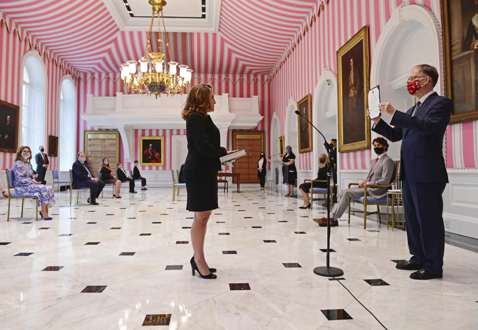Chrystia Freeland is sworn in as Finance Minister by Clerk of the Privy Council Ian Shugart during ceremony following a cabinet shuffle at Rideau Hall in Ottawa on Tuesday, Aug. 18, 2020. (Sean Kilpatrick/The Canadian Press via AP)