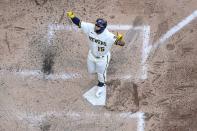 Milwaukee Brewers' Tyrone Taylor reacts after hitting a three-run home run during the fourth inning of a baseball game against the St. Louis Cardinals Thursday, June 23, 2022, in Milwaukee. (AP Photo/Morry Gash)