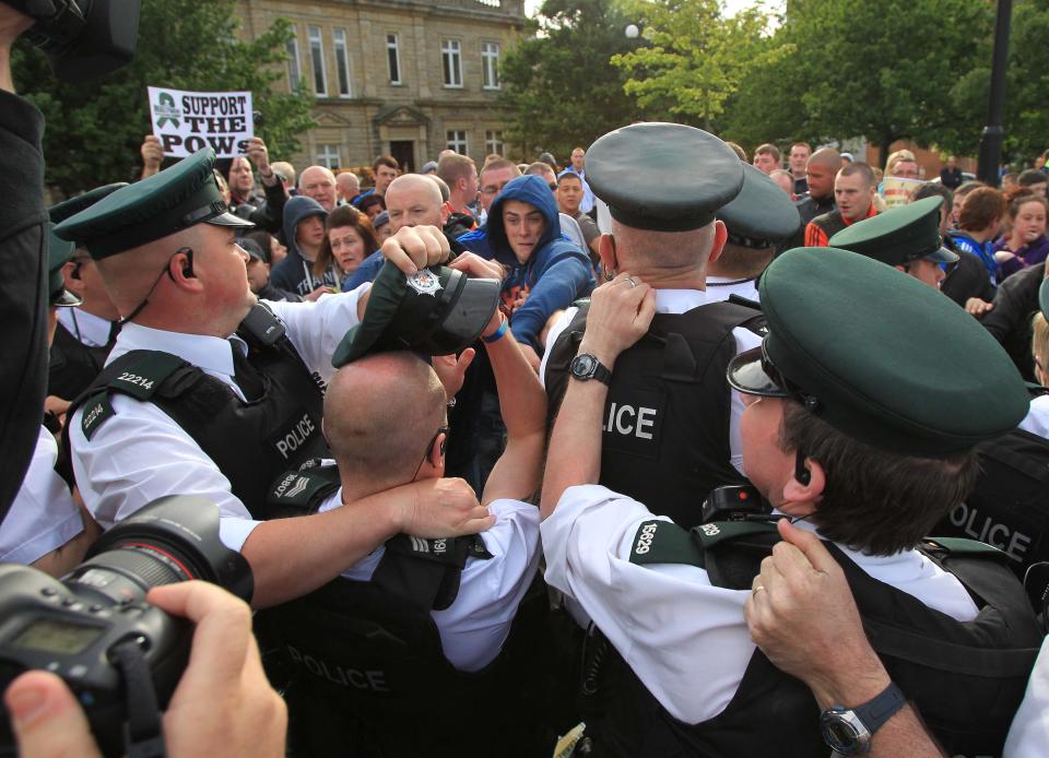 Protestors tussle with police as the Oly