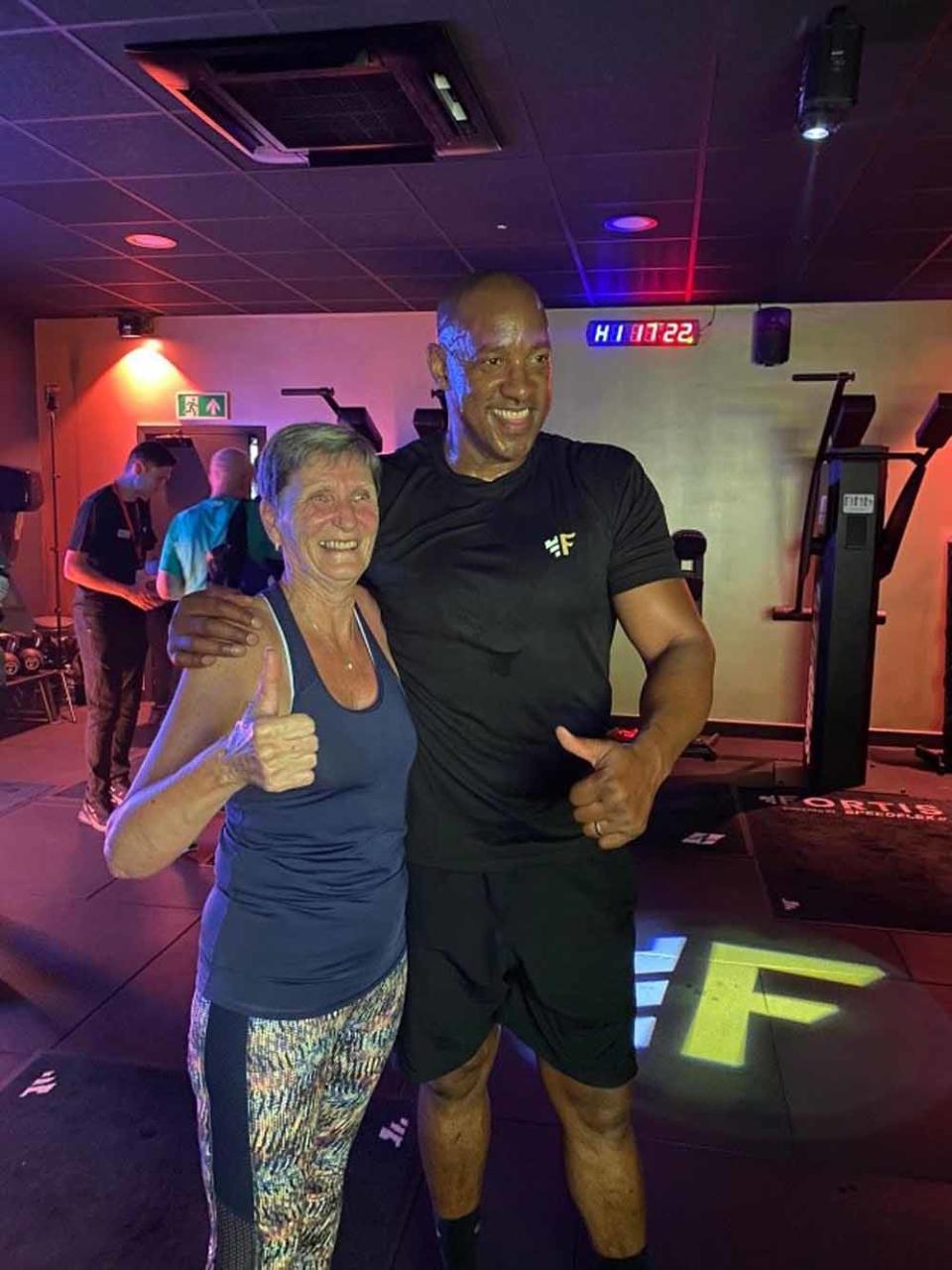 Denise with her trainer, Dion Dublin (Collect/PA Real Life).