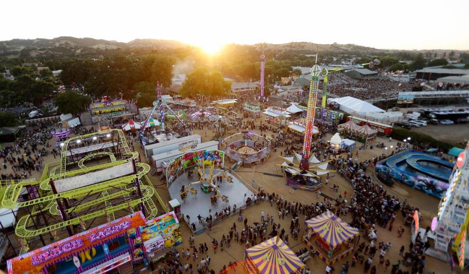 A view of the Mid-State Fair carnival as seen from the Ferris wheel at sunset on Wednesday, July 17, 2024.